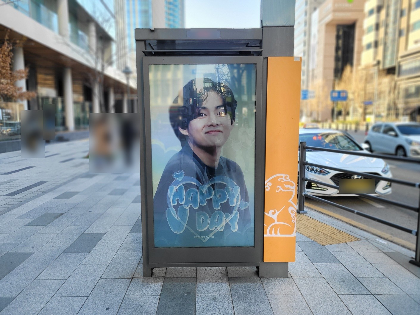 The same screen showing a second design in pale blue, with a smiling portrait and HAPPY V DAY in ice-blue balloon letters